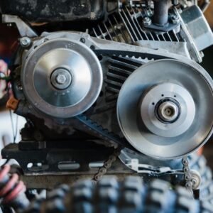 Detailed view of a mechanical assembly showing engine belt and gears. - Photo by Jessica Lewis ???? thepaintedsquare on Pexels
